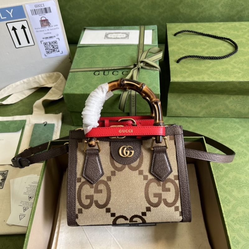 G*u*i top handle bags